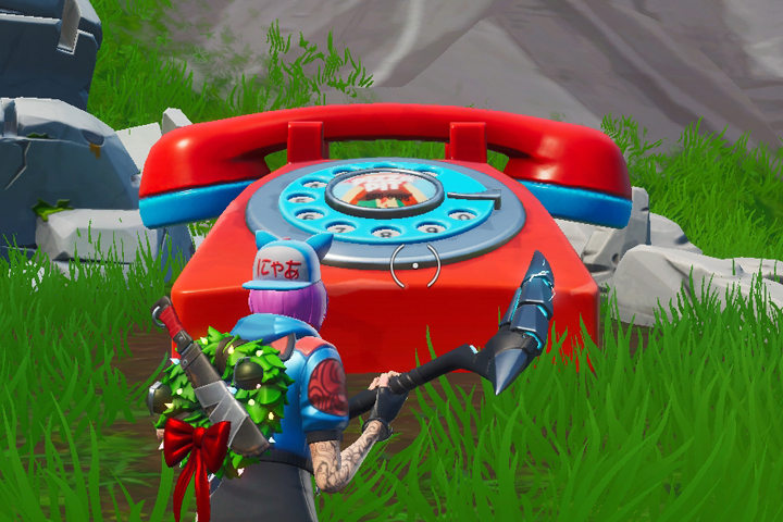 Fortnite : Composer le numéro du Pizza Pit sur le téléphone géant à l'est du Bloc, défis semaine 8 saison 8