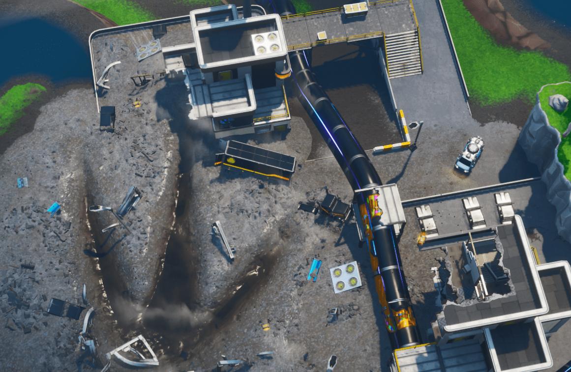 Fortnite : Puce 23 Décryptage, Chercher entre un camping car, une station service et une empreinte monstrueuse, Défi